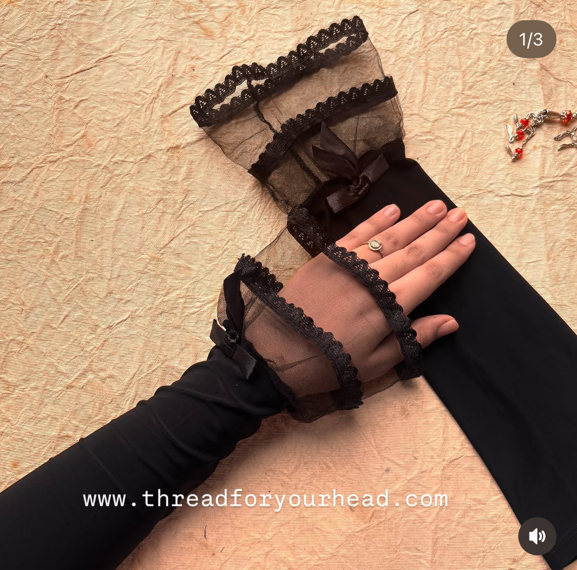 Black Frill Hand Extender