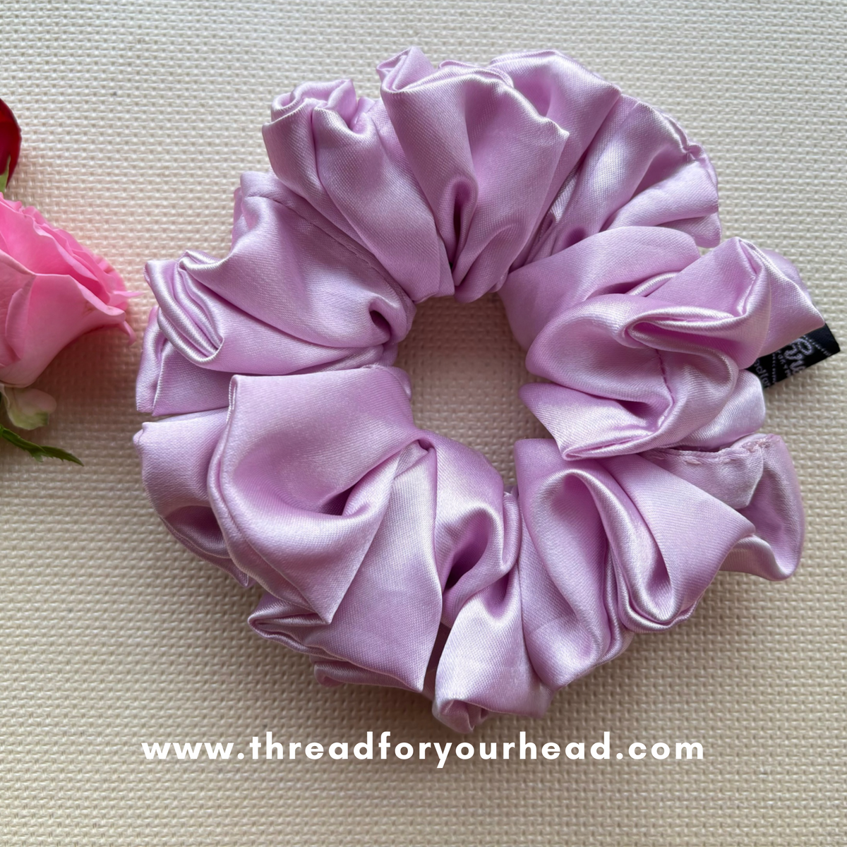 Pink volumizing satin scrunchie